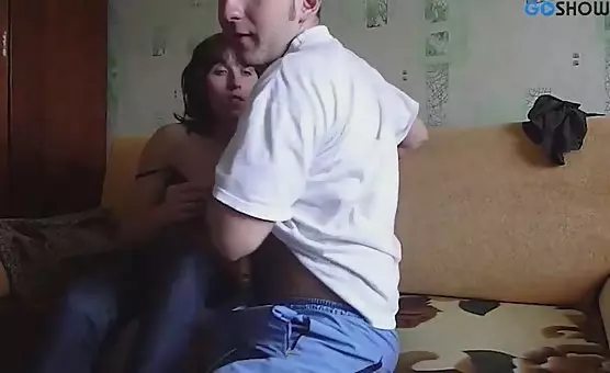 Woman Eagerly Servicing Her Mans Throbbing Penis